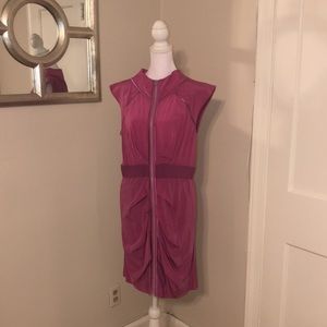Beautiful purple/pink dress with pleating details in the front and back.